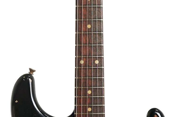 Fender Custom Shop 1961 Stratocaster Heavy Relic Black over Desert Sand #R110080 Fender Custom Shop 1961 Stratocaster Heavy Relic Black over Desert Sand #R110080