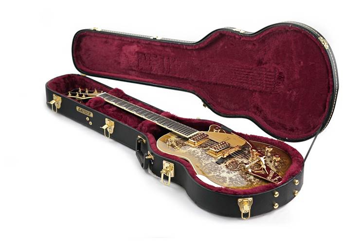 Gretsch G6134TG Limited Edition Paisley Penguin Gold Sparkle Gretsch G6134TG Limited Edition Paisley Penguin Gold Sparkle