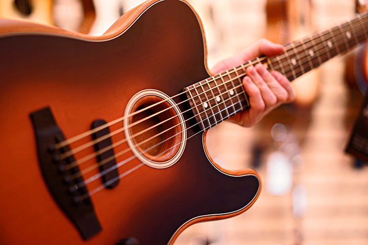 Acoustic guitar store shaped like electric