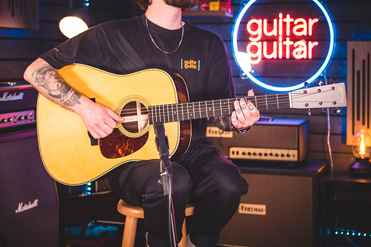 Laminate VS. Solid Top Acoustic Guitar: What's the Difference? News Center